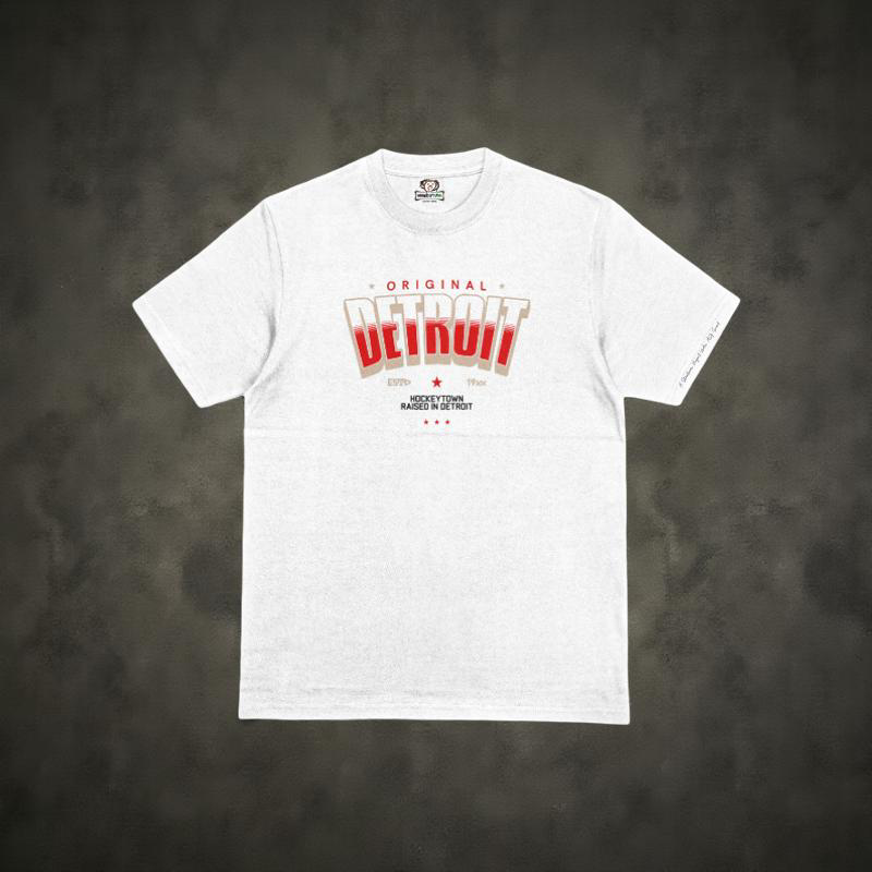 White t-shirt with 'Original Detroit' graphic on a dark gray background